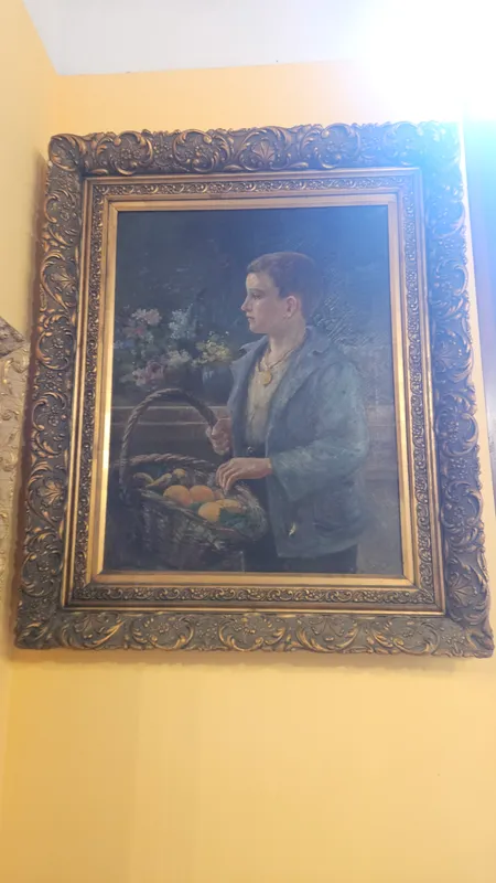 Oleo niño con canasto de principios del siglo xx