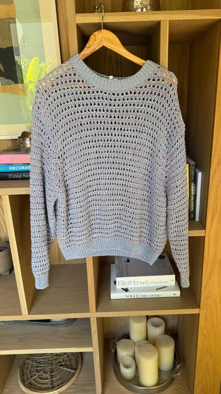 Buzo celeste calado con detalles blanco y rosa Bimba y Lola