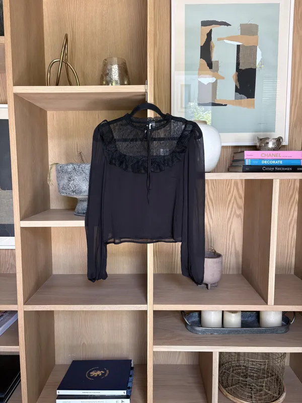 Blusa negra con parte de arriba de encaje H&M